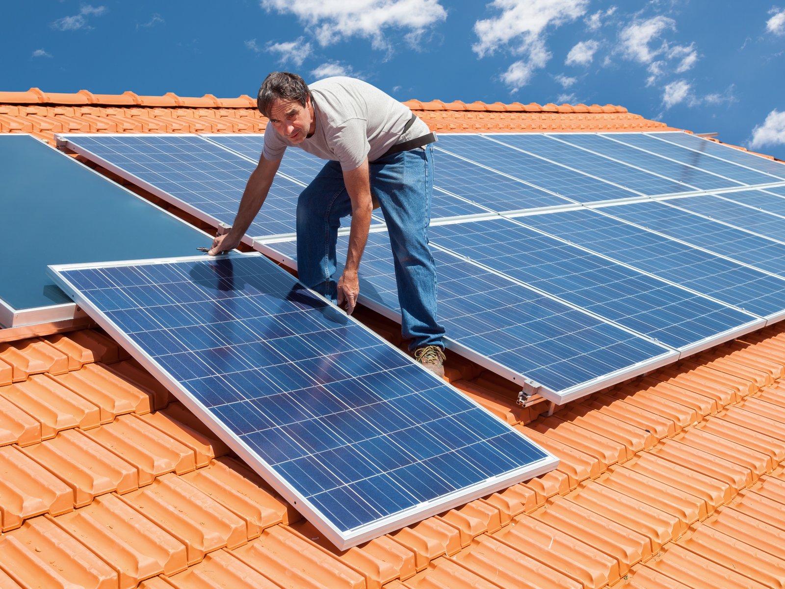 Installation of solar panels on a tiled roof